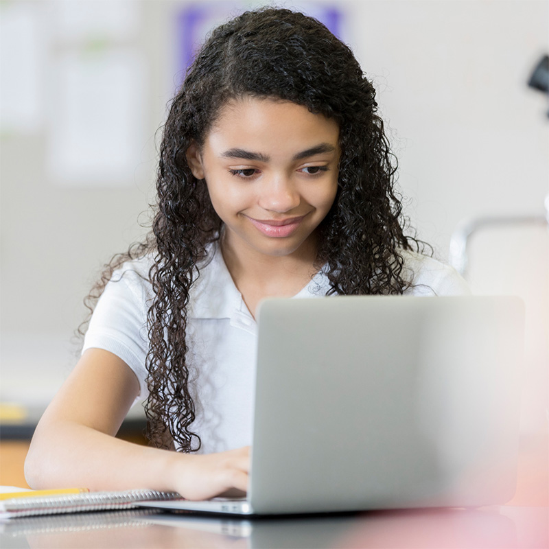 Photo of a student on a laptop - Prepped and Polished - Prepped for Admissions - Massachusetts